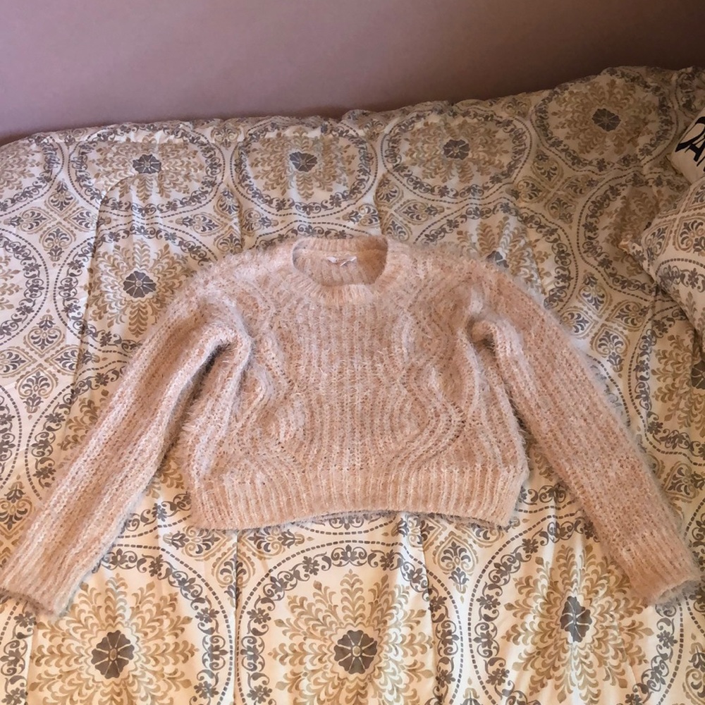 Candie’s fuzzy sweater
